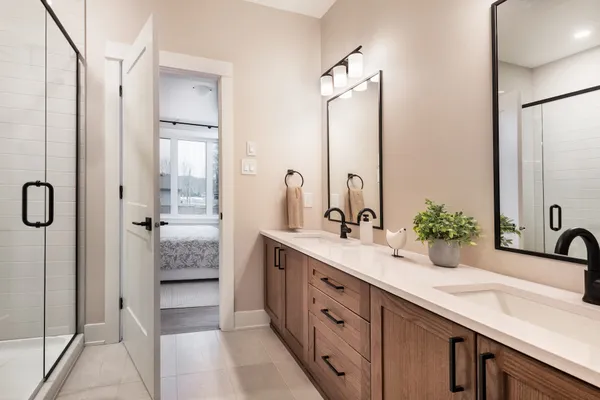Bathroom with double sinks at Watercolour Westport.