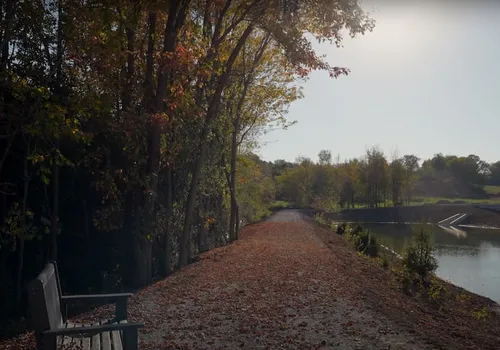 A walking path along a river in Westport, Ontario.