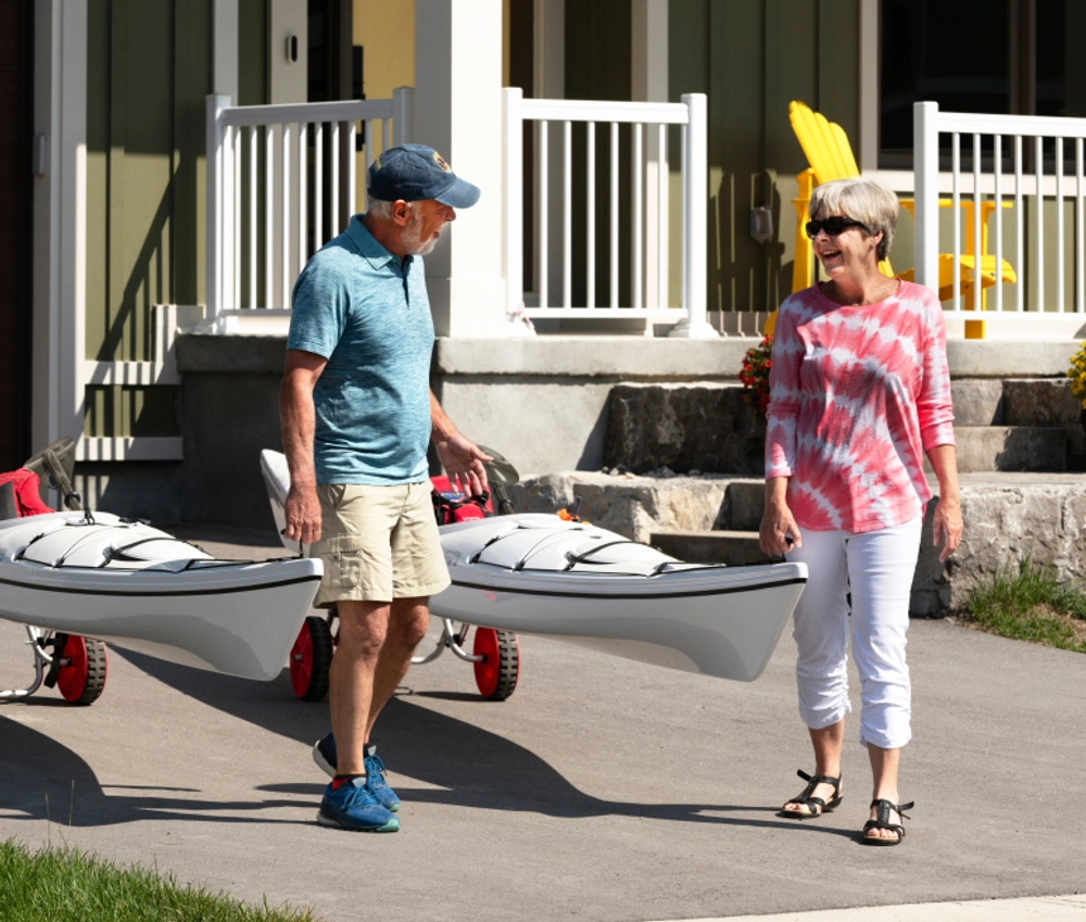 Two residents at Watercolour Westport preparing to go canoeing