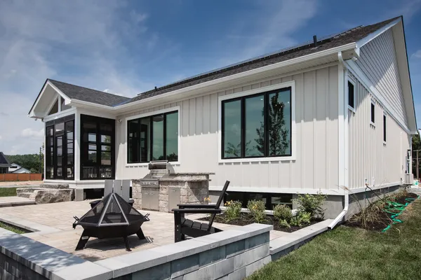 A backyard stone patio of a home in Watercolour Westport.