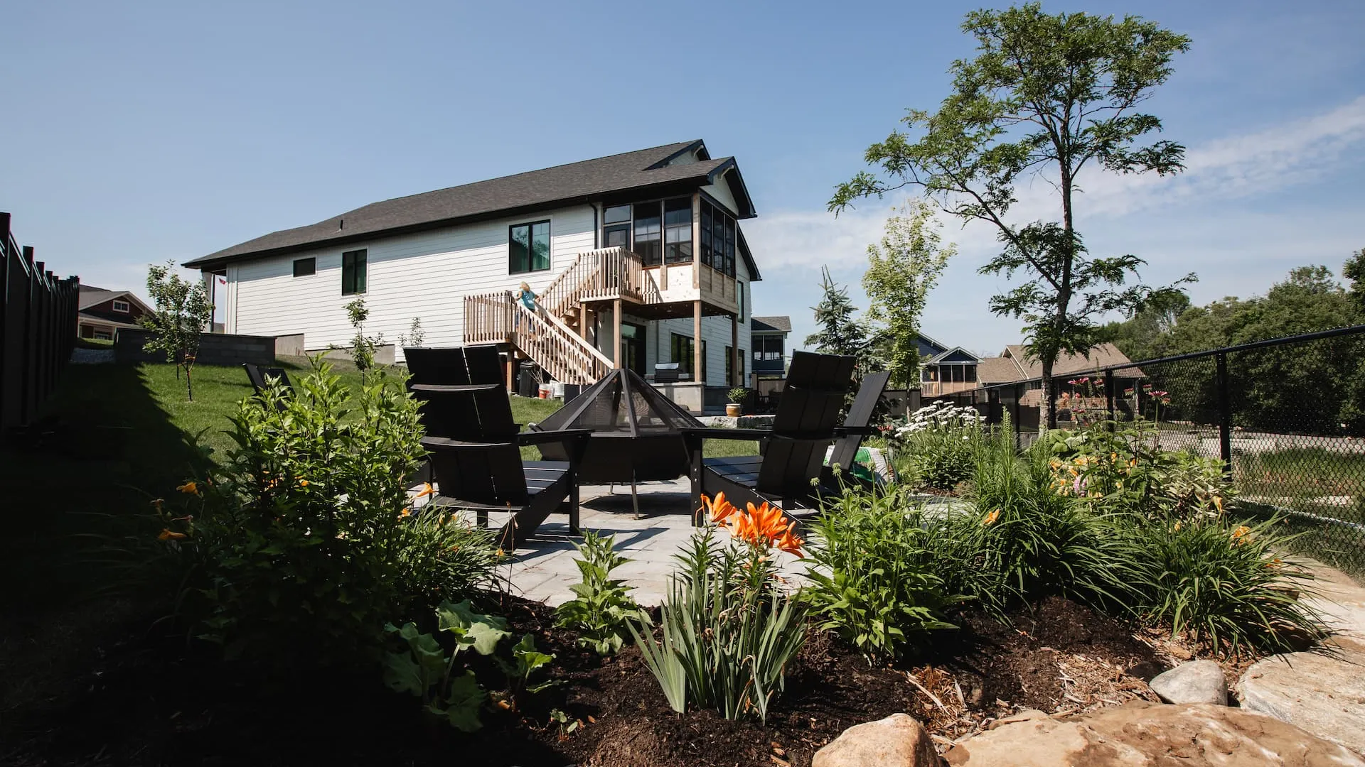 A backyard stone patio of a home in Watercolour Westport.