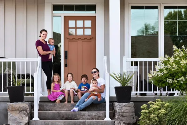 Neighbourhood children gathered on a patio in Watercolour Westport.