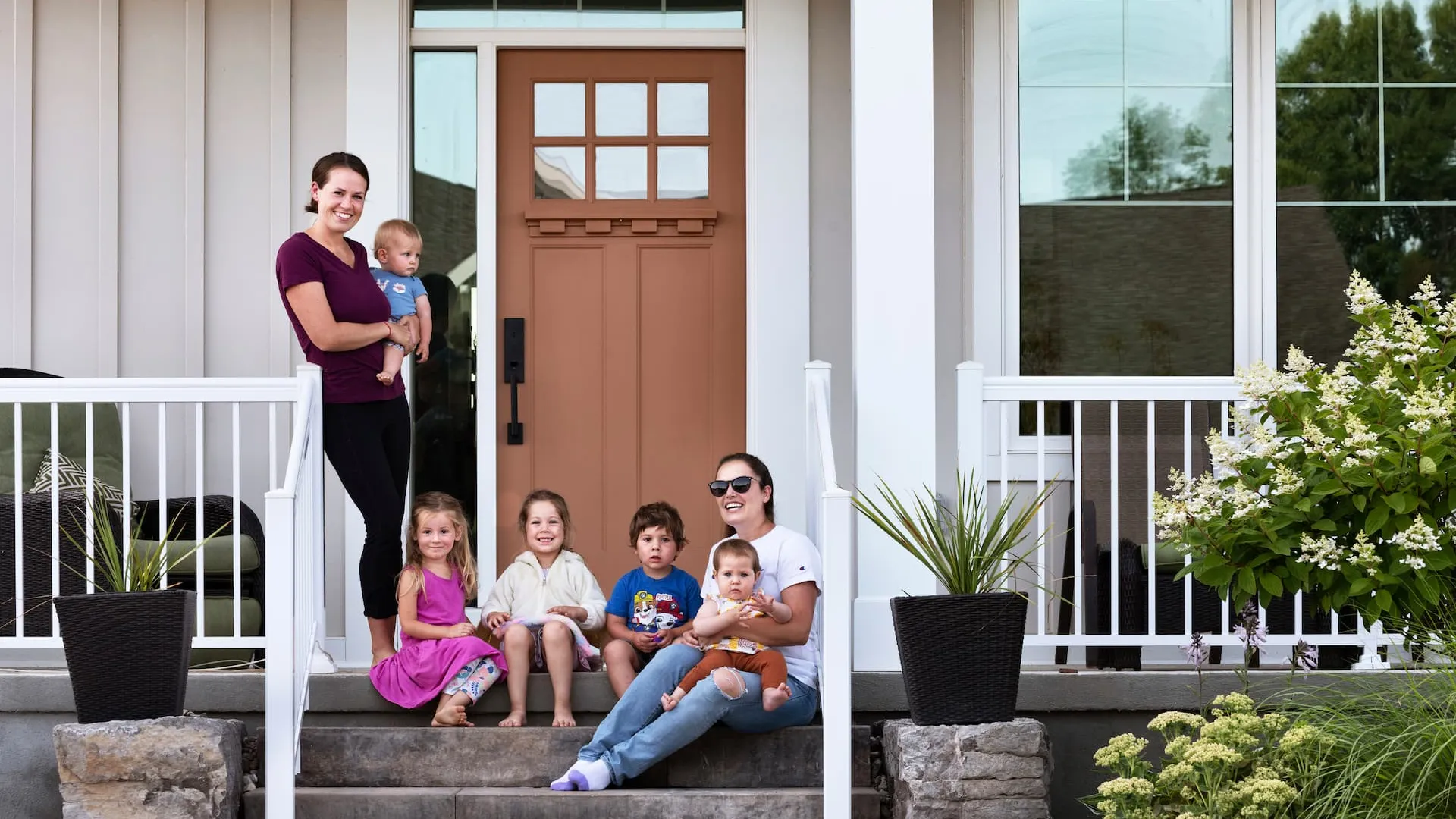 Neighbourhood children gathered on a patio in Watercolour Westport.