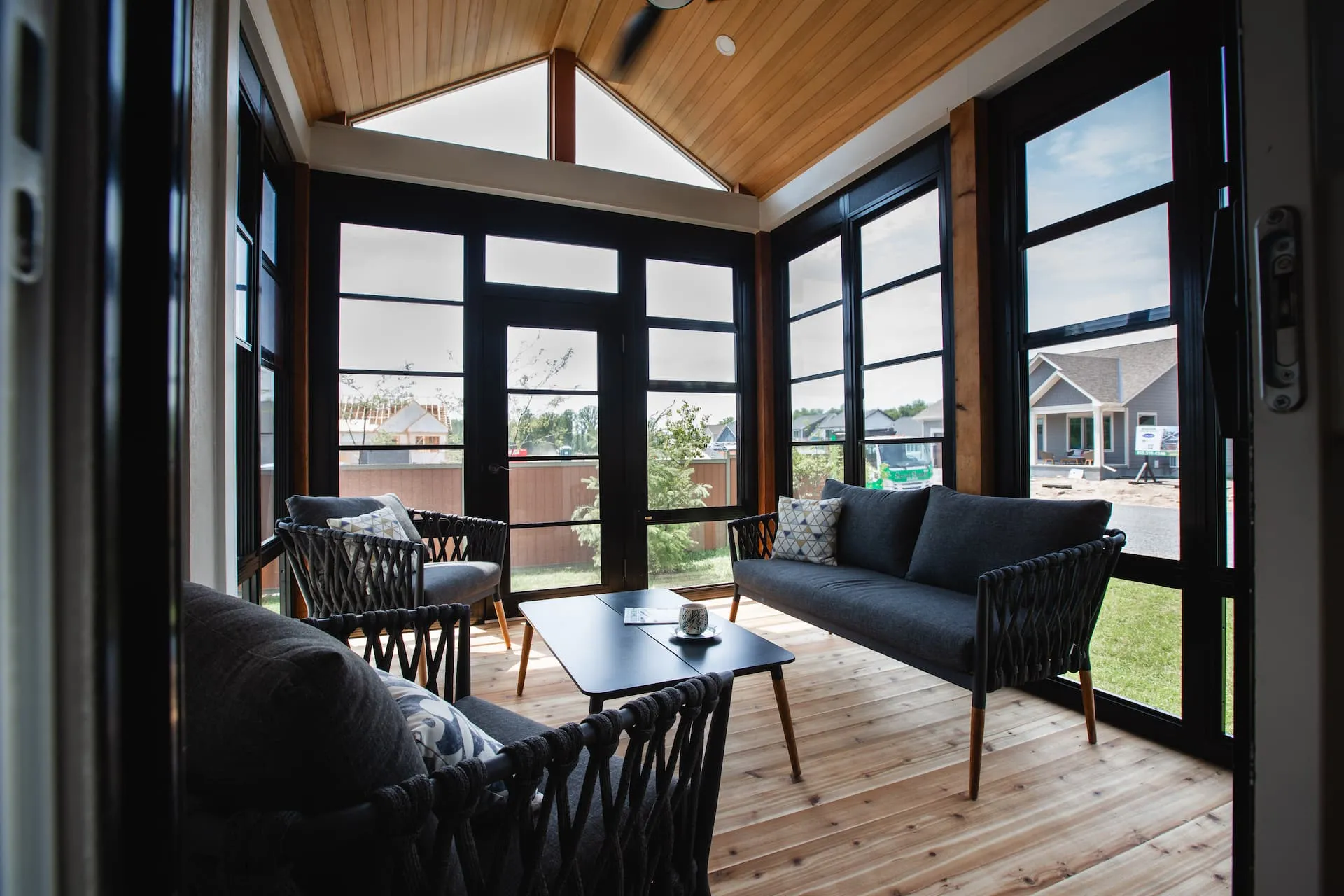 A screened-in porch in a home in Watercolour Westport.