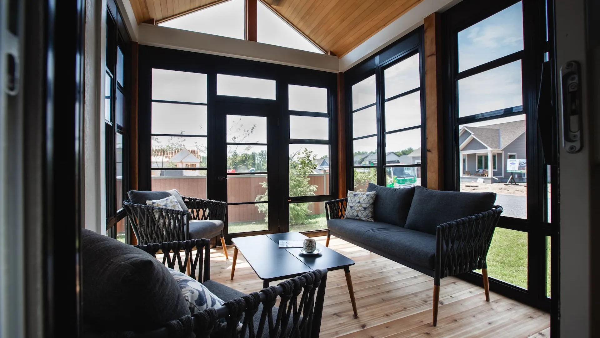 A screened-in porch in a home in Watercolour Westport.