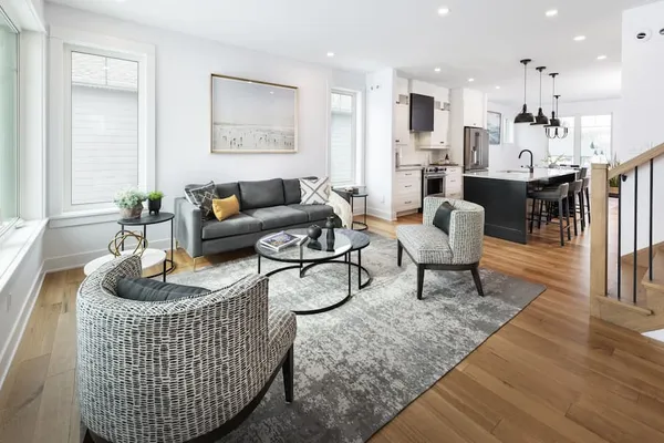 A living room and kitchen at Watercolour Westport.
